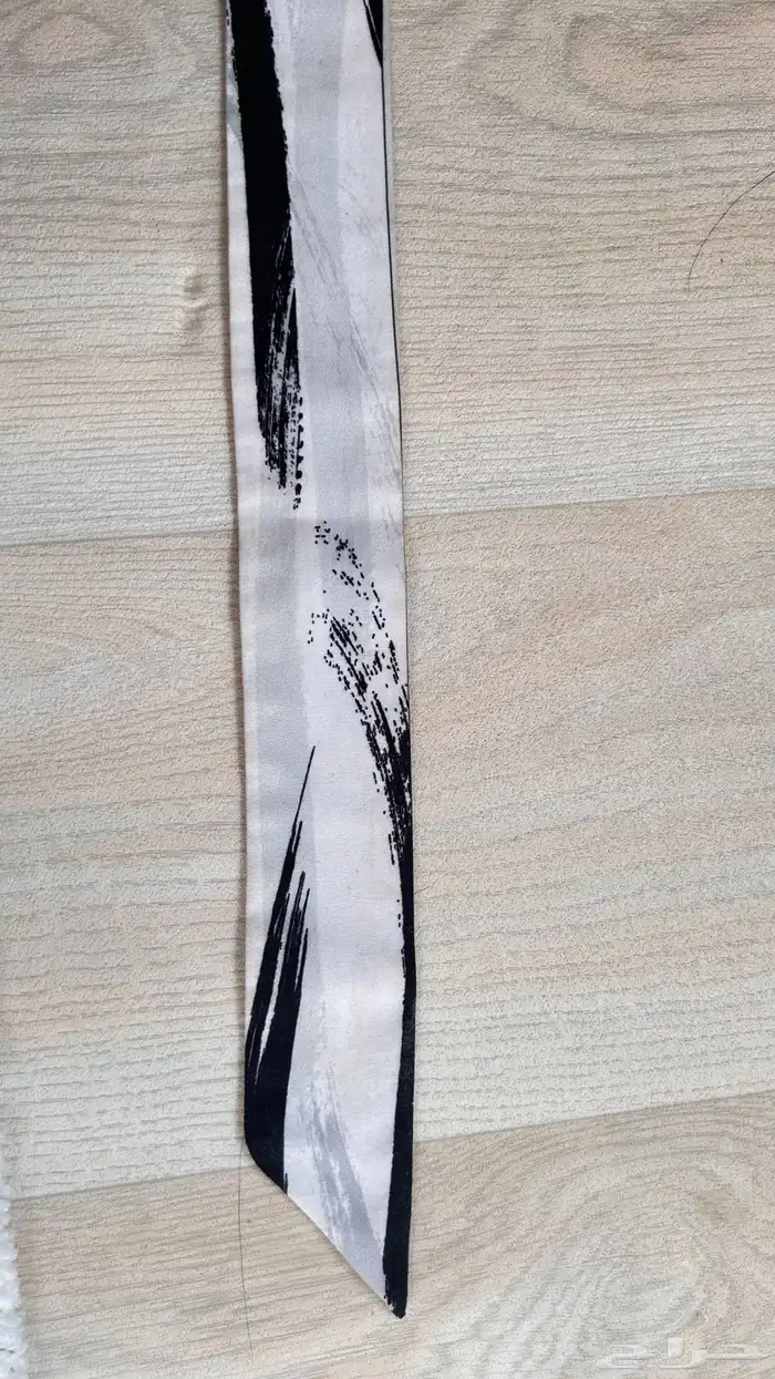 ربطة باور نظيفة بس من الطرف انكب عليها حبر احمر 0