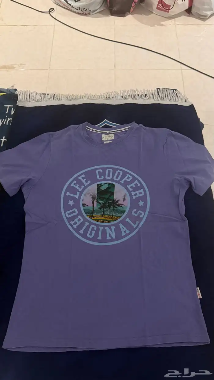 تيشيرت بنفسجي مستعمل مقاس M 0