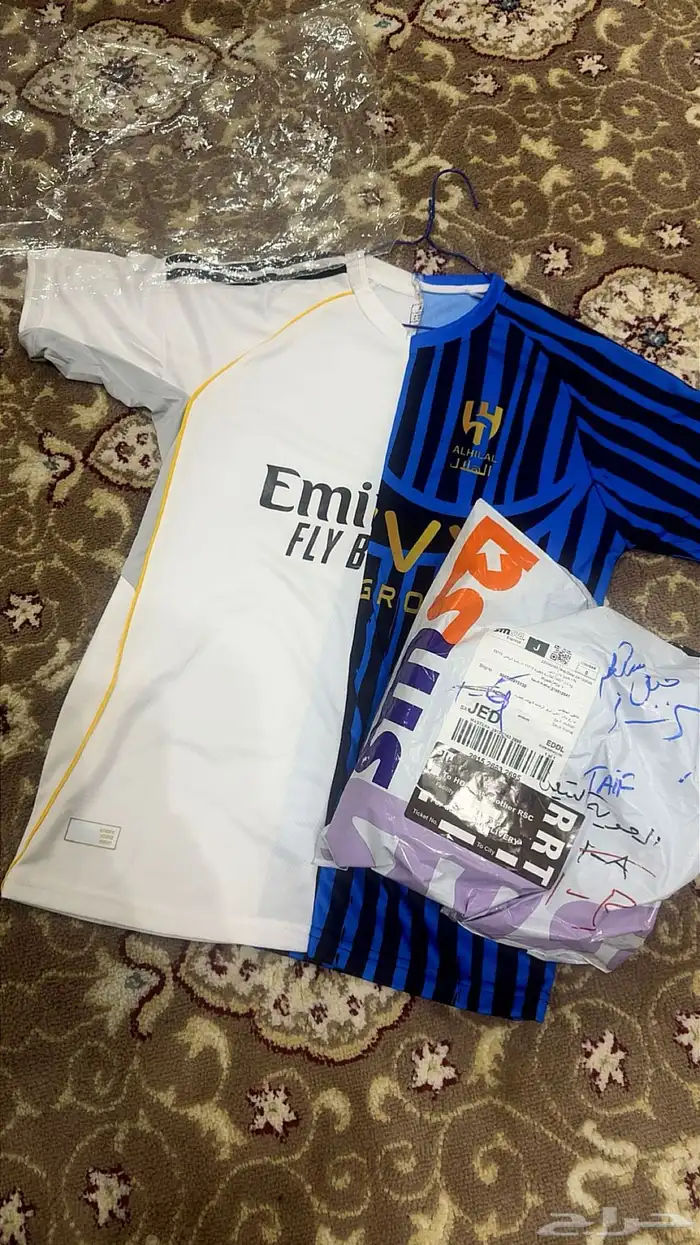 بدلة نص ريال مدريد ونص الهلال وعليها نتيجه كاس العالم 1