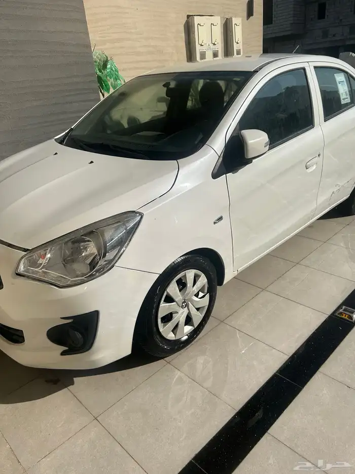 سيارة ميتسوبيشي اتراج 1