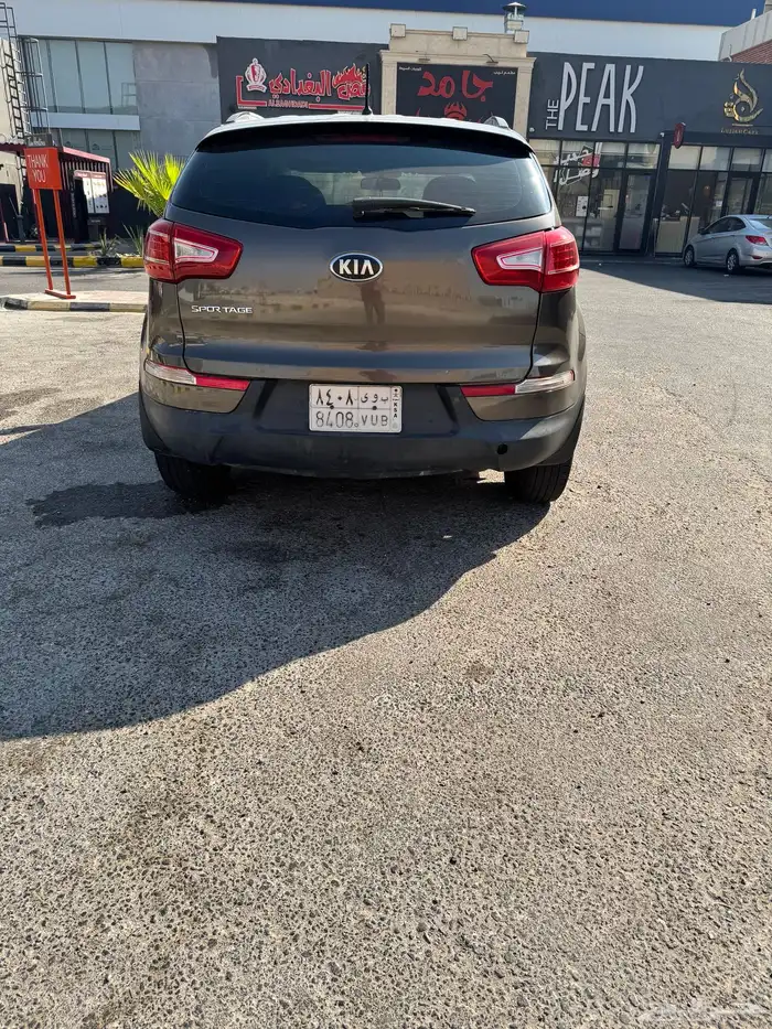 للبيع كيا سبورتاج 2013 نظيفة جدا 2000 سي سي   لون بني 5