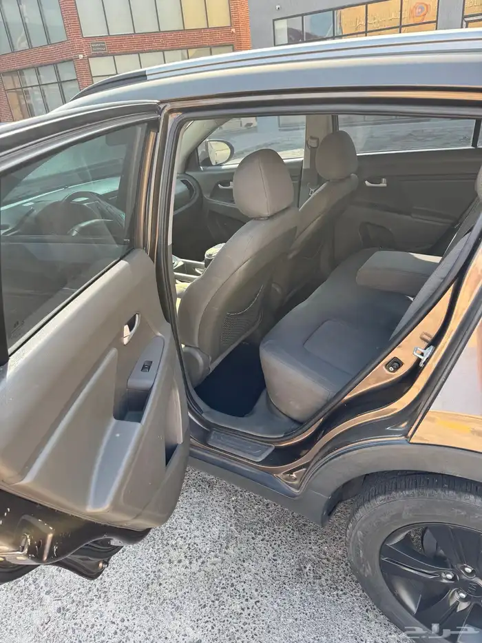 للبيع كيا سبورتاج 2013 نظيفة جدا 2000 سي سي   لون بني 7