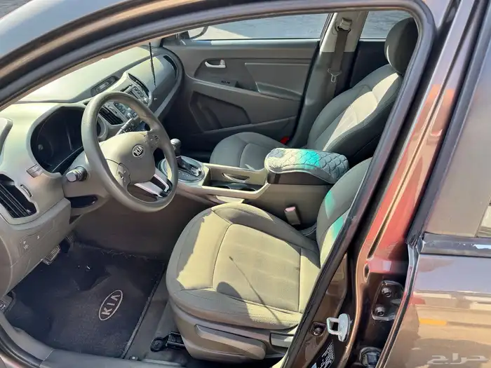 للبيع كيا سبورتاج 2013 نظيفة جدا 2000 سي سي   لون بني 9