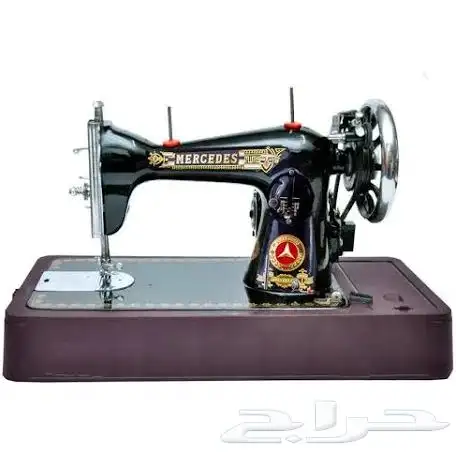 مكينه خياطه ملابس 0