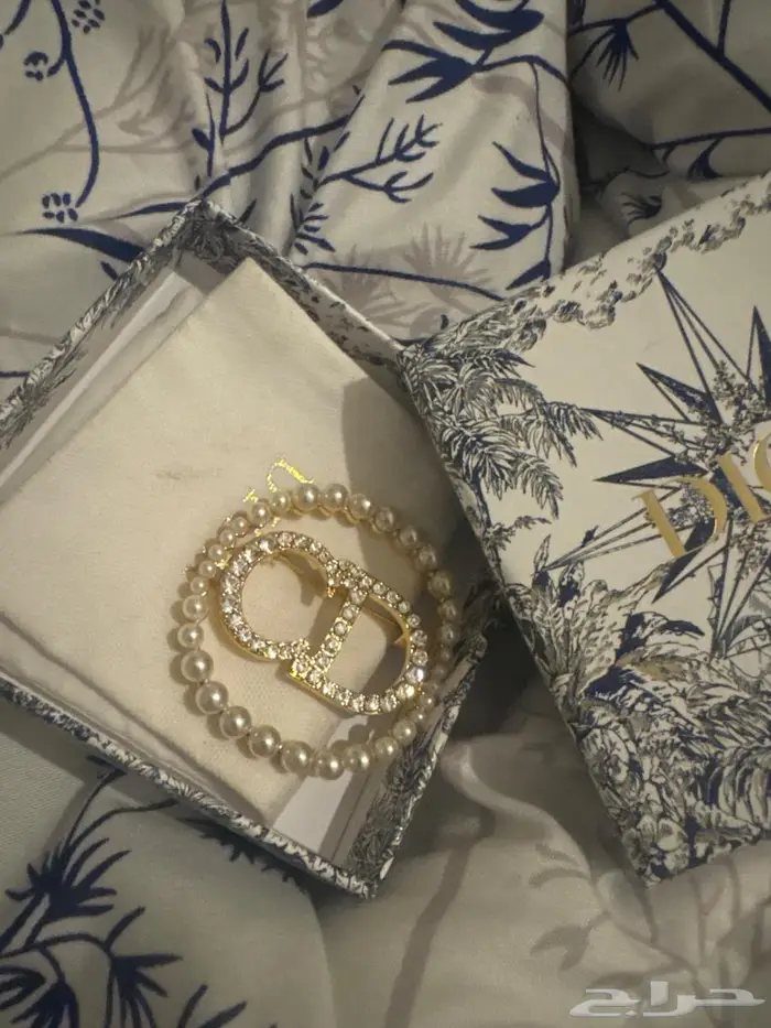 بروش ديور الاصلي 0