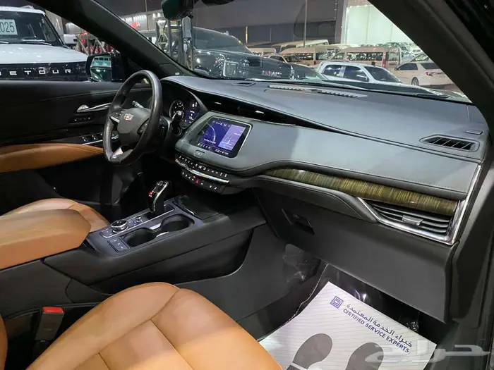 كاديلاك اكس تي 4 موديل 2023 اسود فل سعودي ماشيه 20 الف كم 34