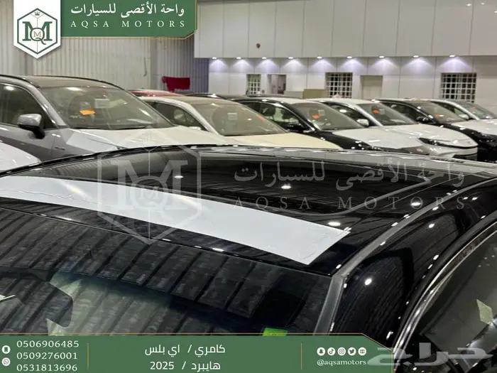 كامري E بلس أسود هايبرد 2025 عليها عرض 18