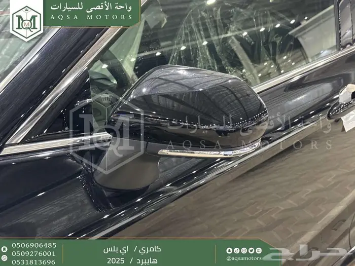 كامري E بلس أسود هايبرد 2025 عليها عرض 21