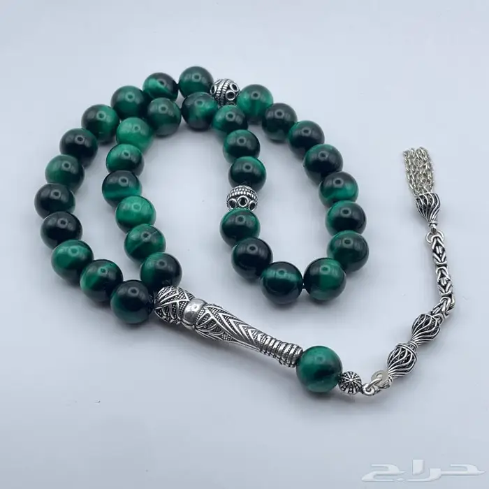 سبحة مميزة من التايجر الاخضر مطعمة فضة 1