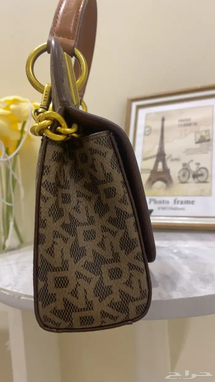 فايندرا حلق فضه ساعه ديور درجه اولى وشنطه كروسبوديDKNY 16