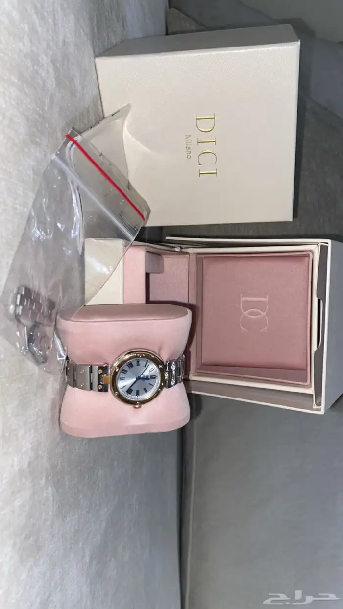 فايندرا حلق فضه ساعه ديور درجه اولى وشنطه كروسبوديDKNY 12