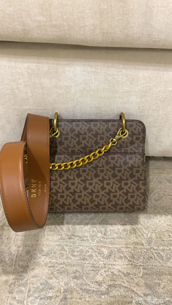 فايندرا حلق فضه ساعه ديور درجه اولى وشنطه كروسبوديDKNY 8