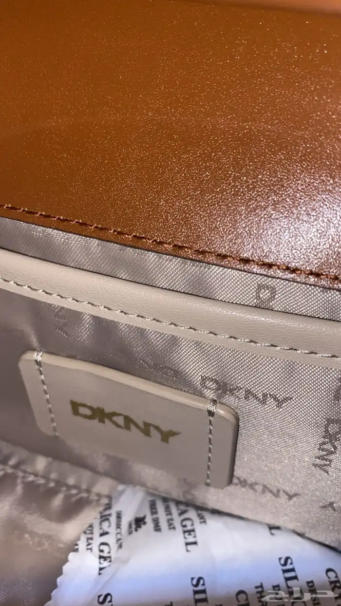 فايندرا حلق فضه ساعه ديور درجه اولى وشنطه كروسبوديDKNY 18