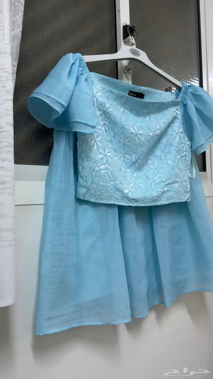 طقم تنورة وبلوزة 0