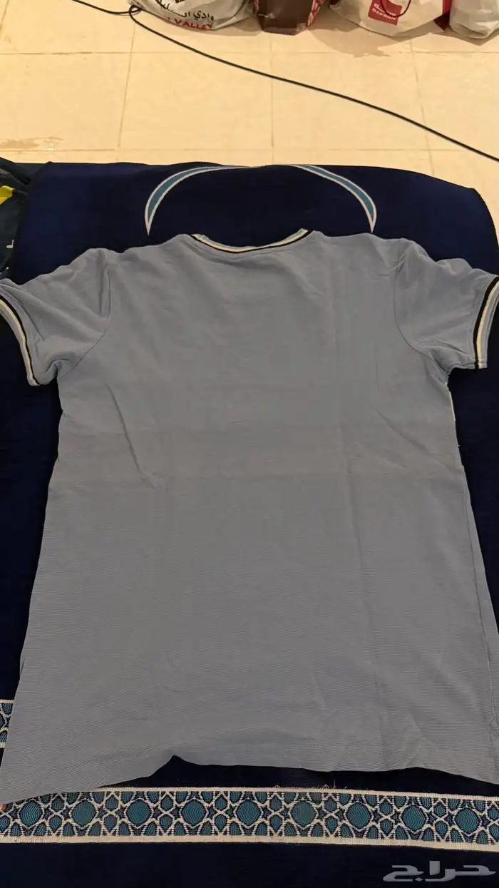 تيشيرت سماوي مستعمل مقاس M 1