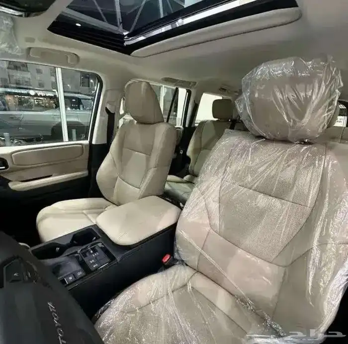 تويوتا برادو 2025 تي اكس ال 2 اقساط بنزين ابيض لؤلؤي . 7