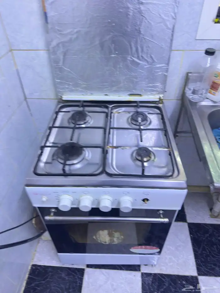 غسالة سامسونج 7 Kg   بوتاجاز 4 شعلة 1