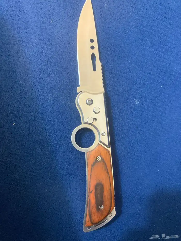 سكين اوتماتيك تنفتح ب الزر و فيها امان 1