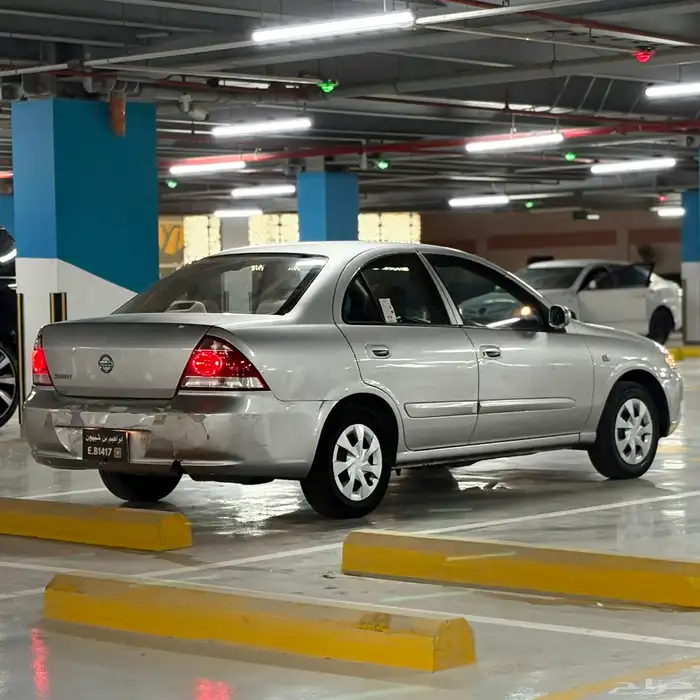 نيسان صني 2008 قير عادي شامله نقل ملكيه 10