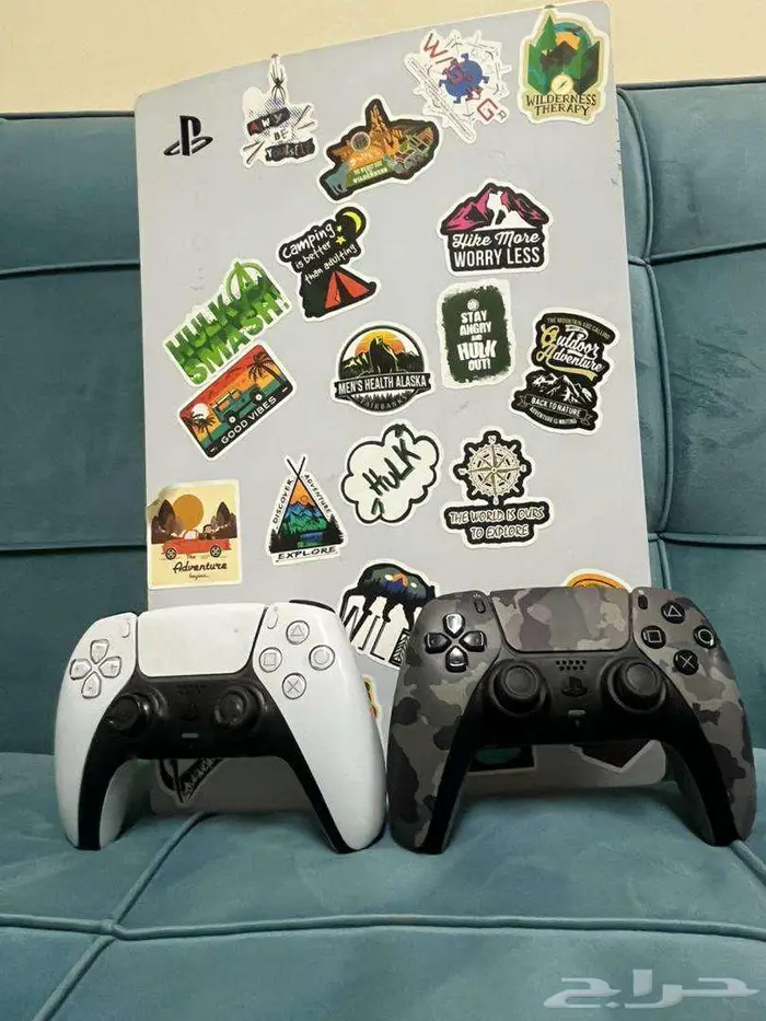 Playstation 5 with 2 controllers and 4 CDs 0