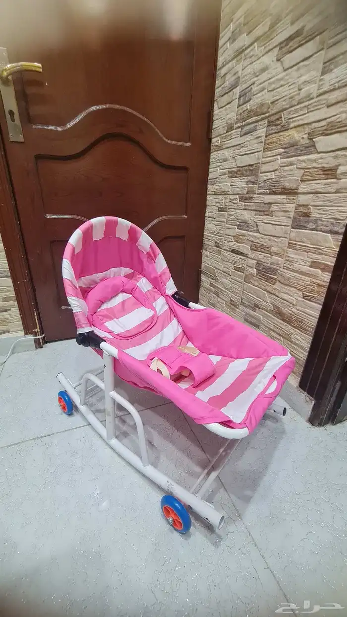 كرسي اطفال هزاز مع كفرات يتحرك 1