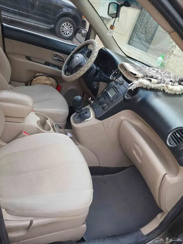 كيا كارنز 2012 11