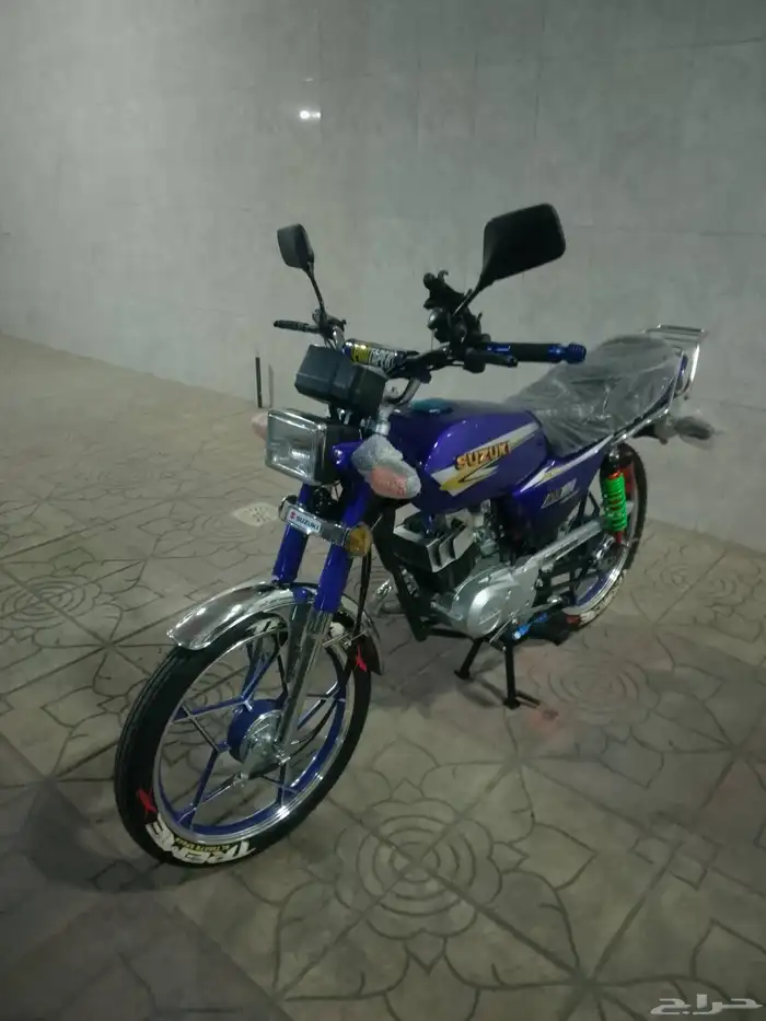 أكس 100 وسام ناري أزرق 2026 محول سوزوكي 16