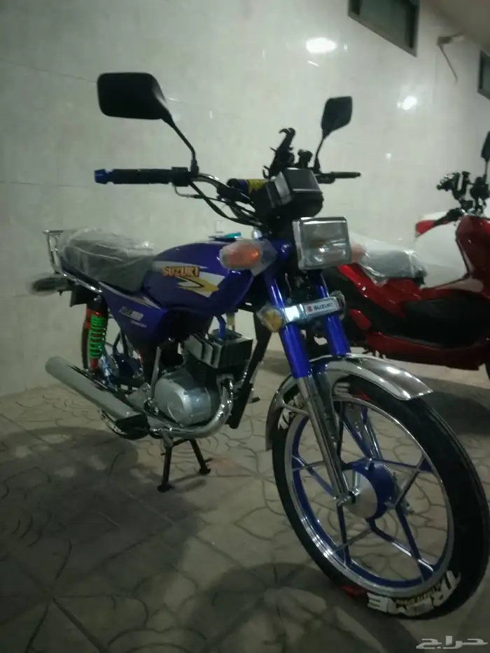أكس 100 وسام ناري أزرق 2026 محول سوزوكي 13