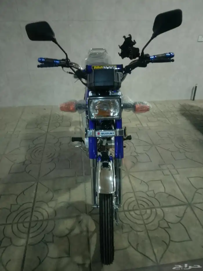 أكس 100 وسام ناري أزرق 2026 محول سوزوكي 17