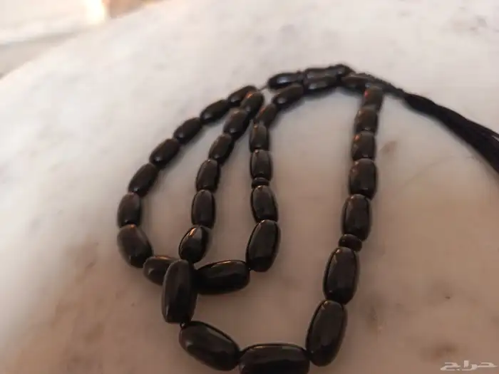 مسباح كهرمان اسود نقي و رحيته واضحة وجميلة 3