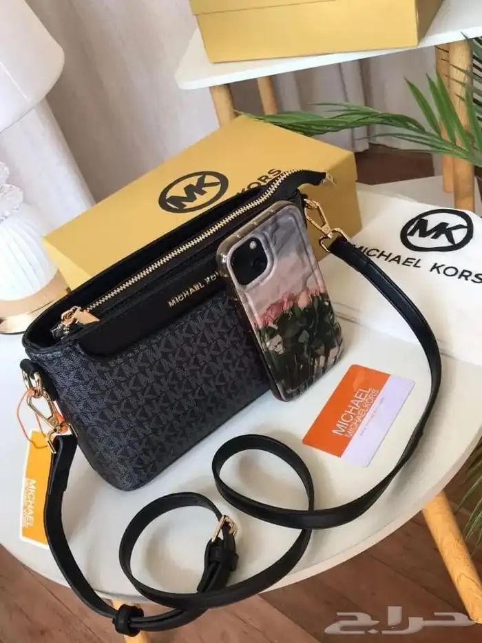 يتوفر جميع انوع الشنط الماركه توصيل جده ورياض 9