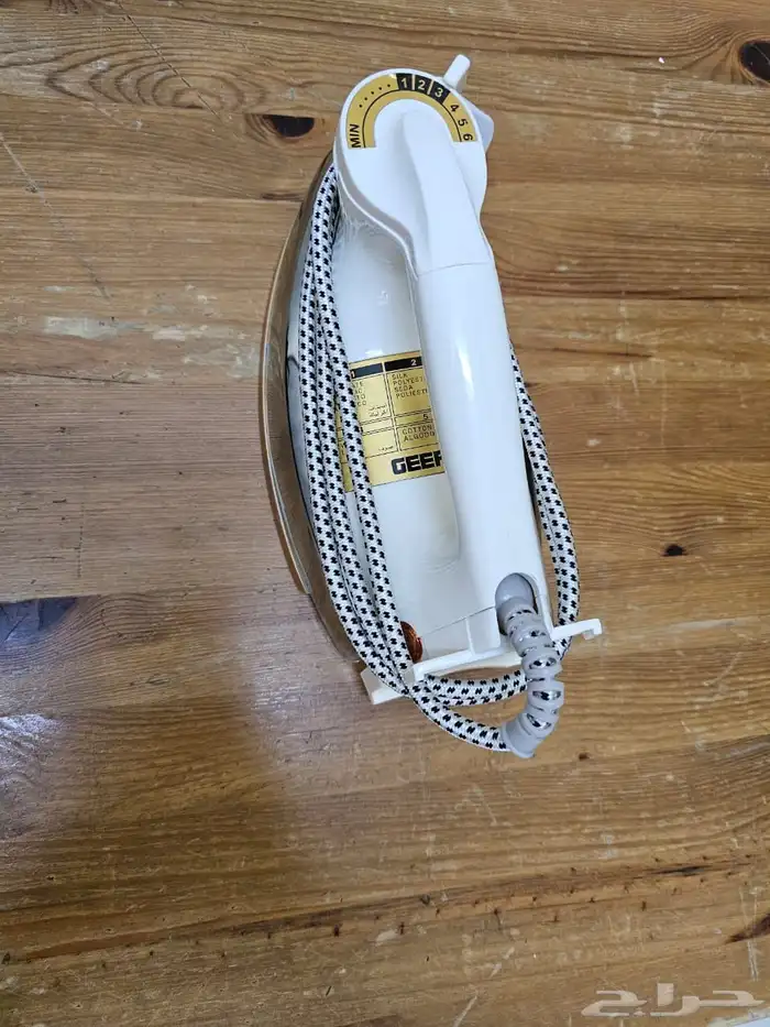 مكواة ملابس 1