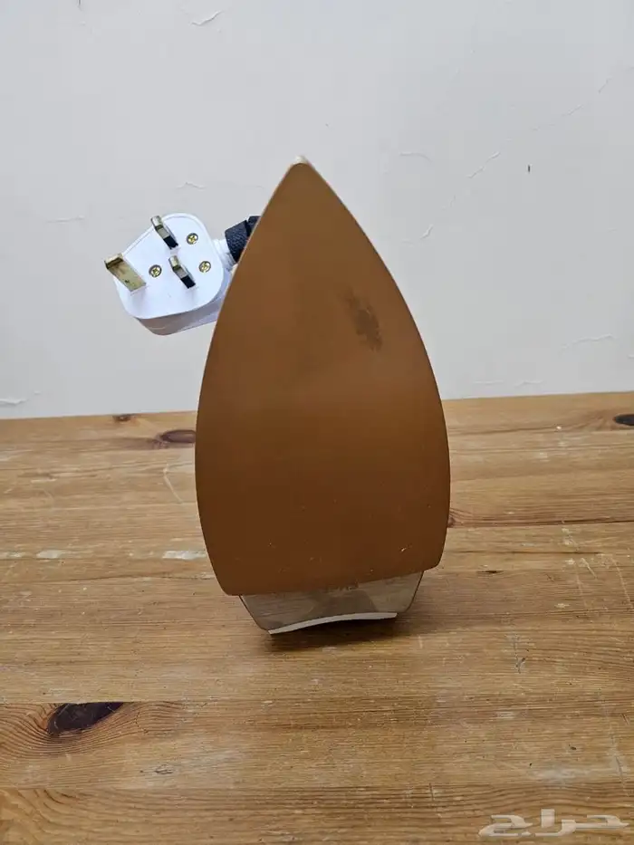 مكواة ملابس 4