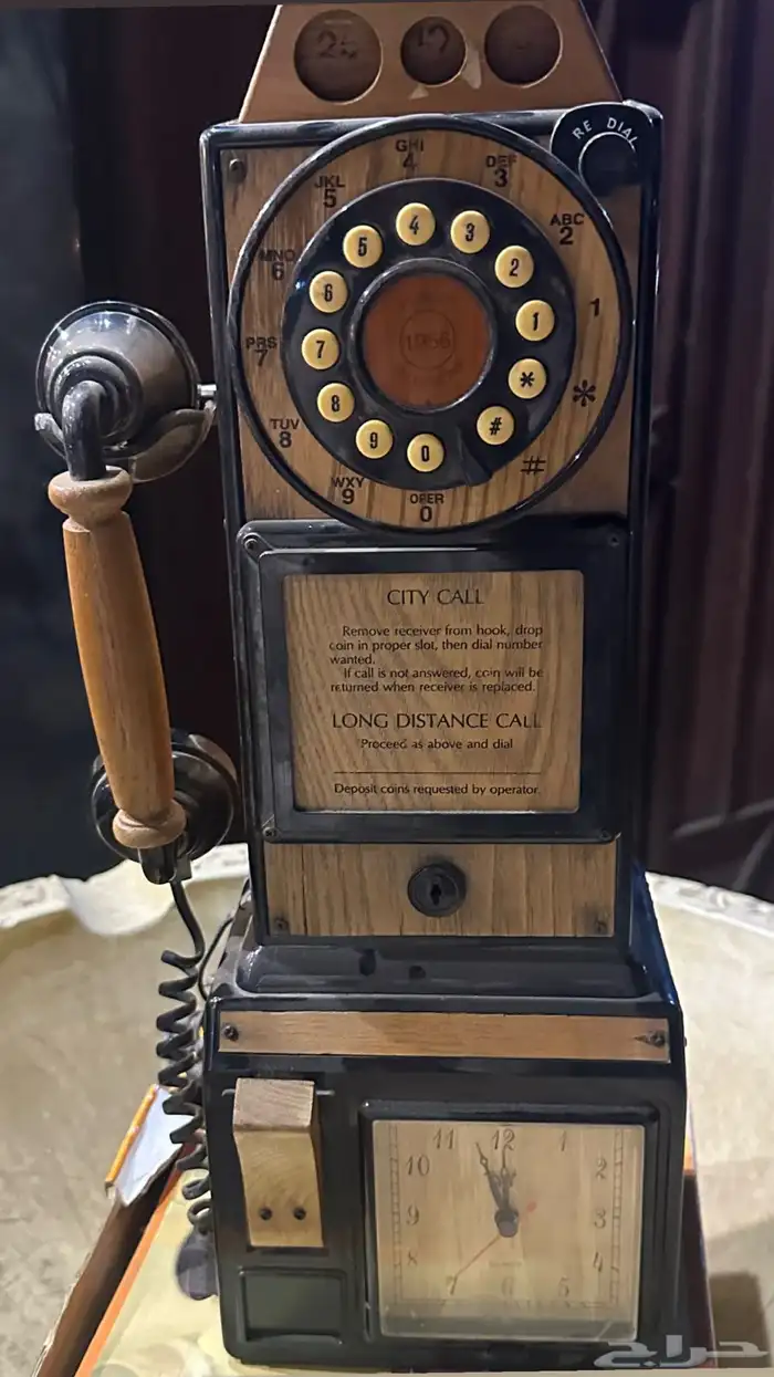 تلفون و ساعه 0