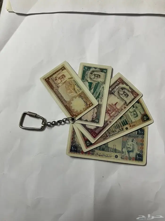 ميداليات مفاتيح على شكل عملات 2