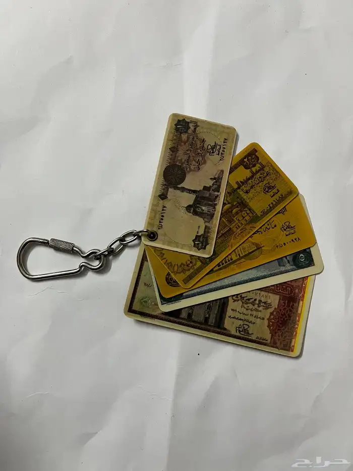 ميداليات مفاتيح على شكل عملات 5