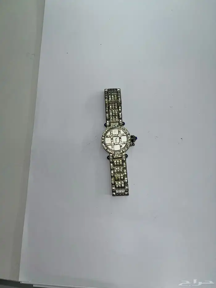 ساعات نسائية قديمة ماركة اصلية وفيها ذهب و الماس 8