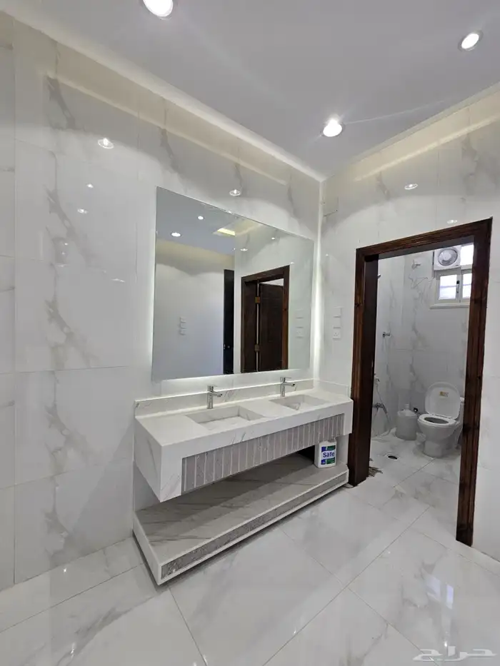 للبيع شقه ارضيه ببايكة سيارة وحوش وسيع ف ابها حي الزهور 4