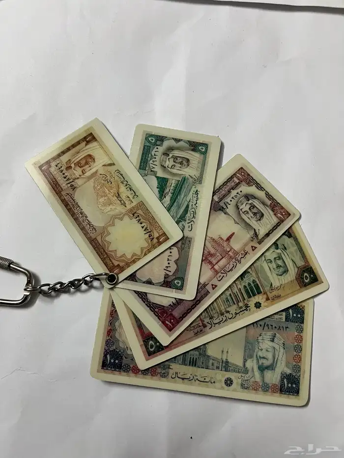 ميداليات مفاتيح على شكل عملات 1