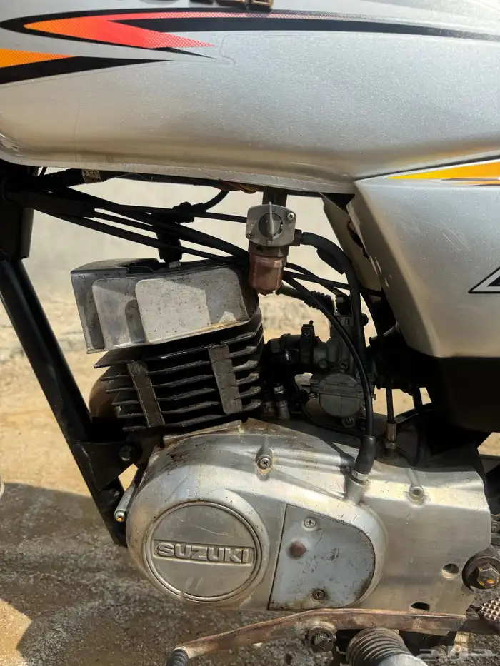 دباب سزوكي الاصلي AX100 1