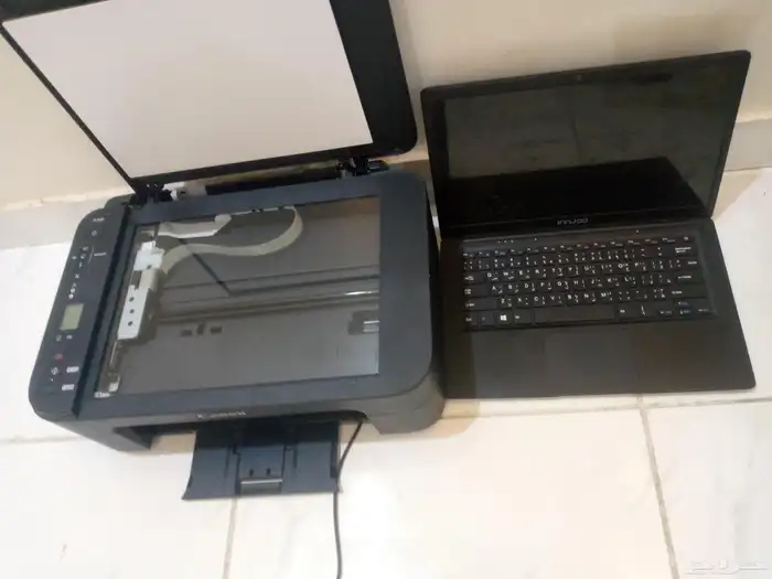 لابتوب وطابعه 0