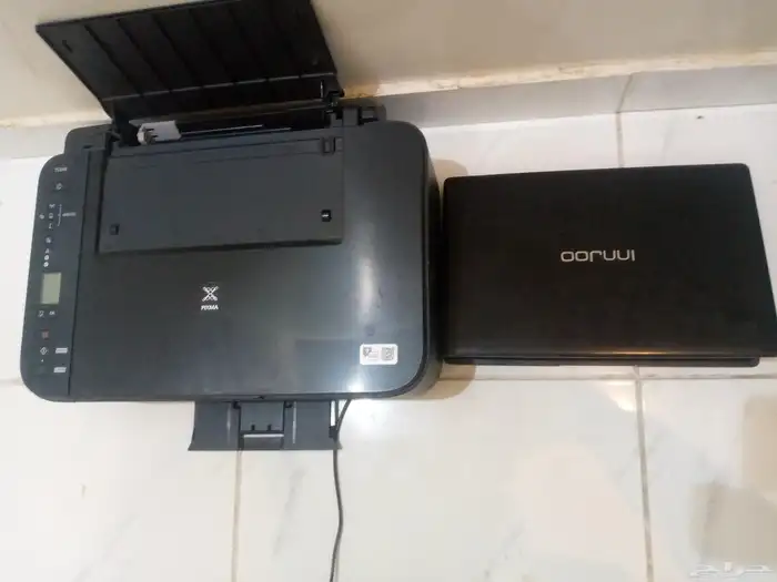 لابتوب وطابعه 1