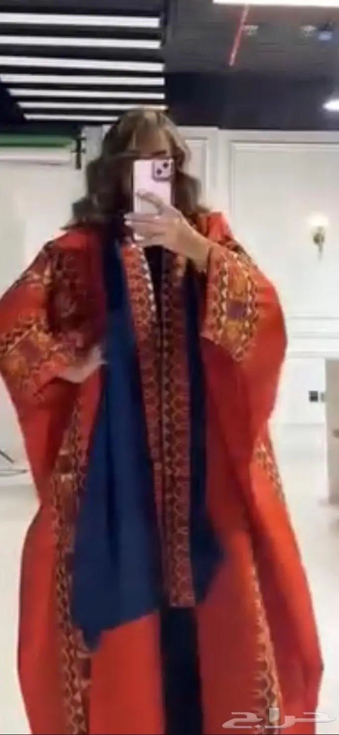 عبايه برتقاليه من ثري لاينز 0