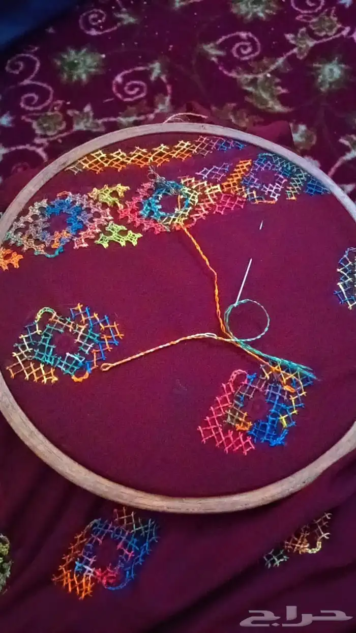 خياطه ملابس على يد 1