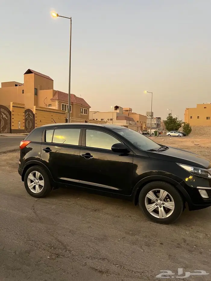 كيا سبورتاج نص فل 2012 4