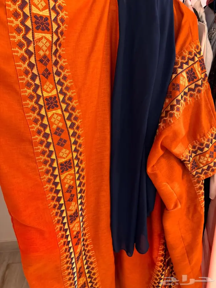 عبايه برتقاليه من ثري لاينز 2