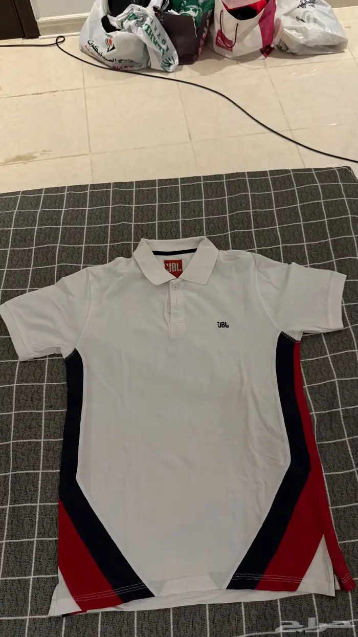 تيشيرت ابيض مستعمل مقاس L 0