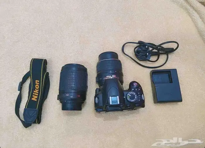 كاميرا نيكون 31000 عدستين عدسه الاصلي وعدسه -55-200- 0