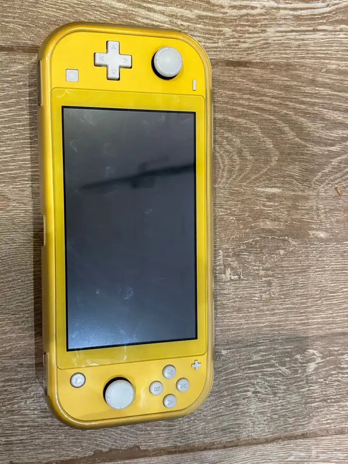 جهاز ننتيندو سويتش لايت اصفر 0