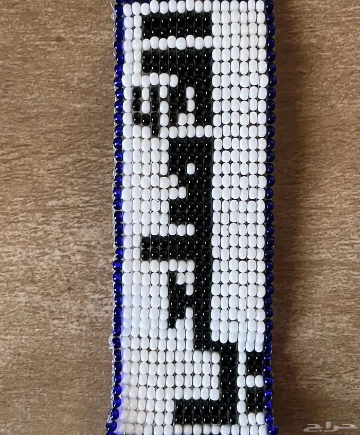 ميدالية مفاتيح بالاسم الاصلعي خرز 6